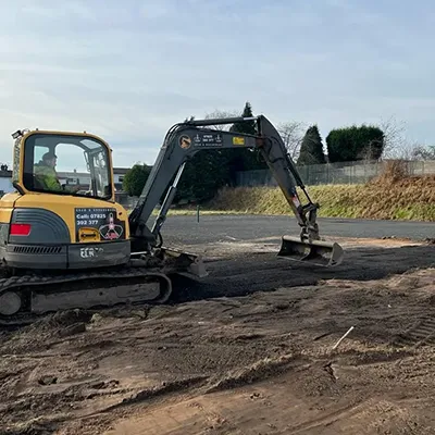 A bulldozer is parked on the side of the road.