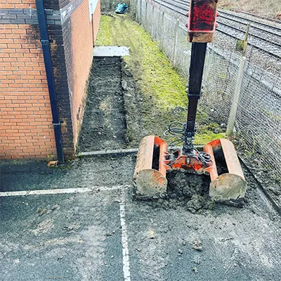 a parking meter sitting on the side of a road